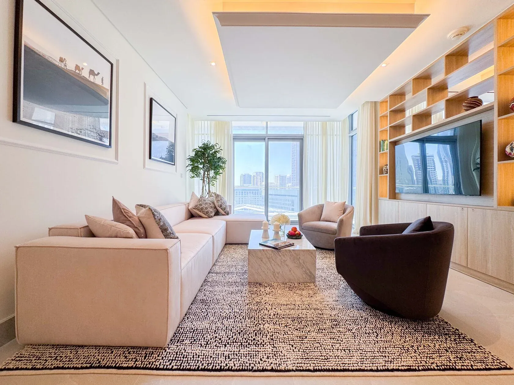 Neo-Modern 2-Bed Apartment – living area with feature shelving and lowered ceiling