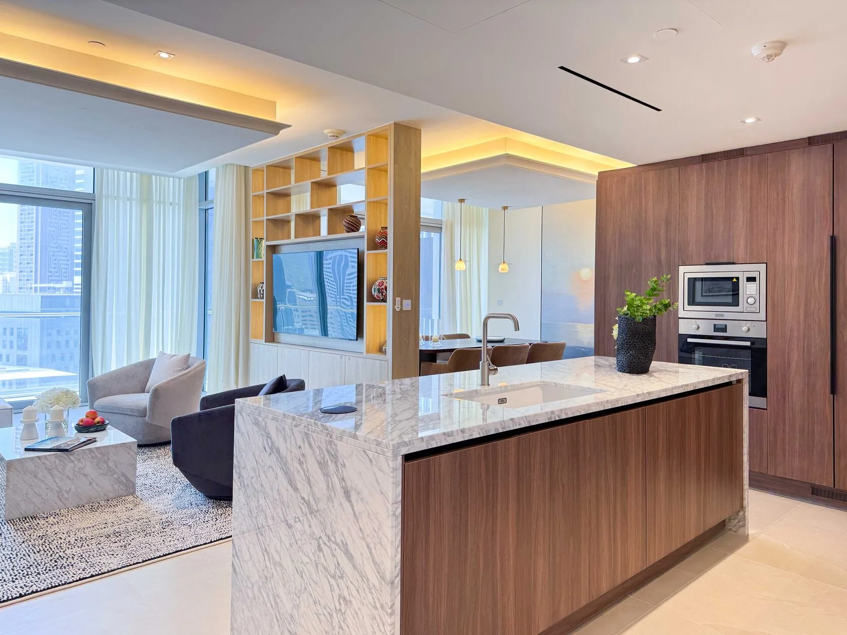 Neo-Modern 2-Bed Apartment – kitchen with marble-topped island